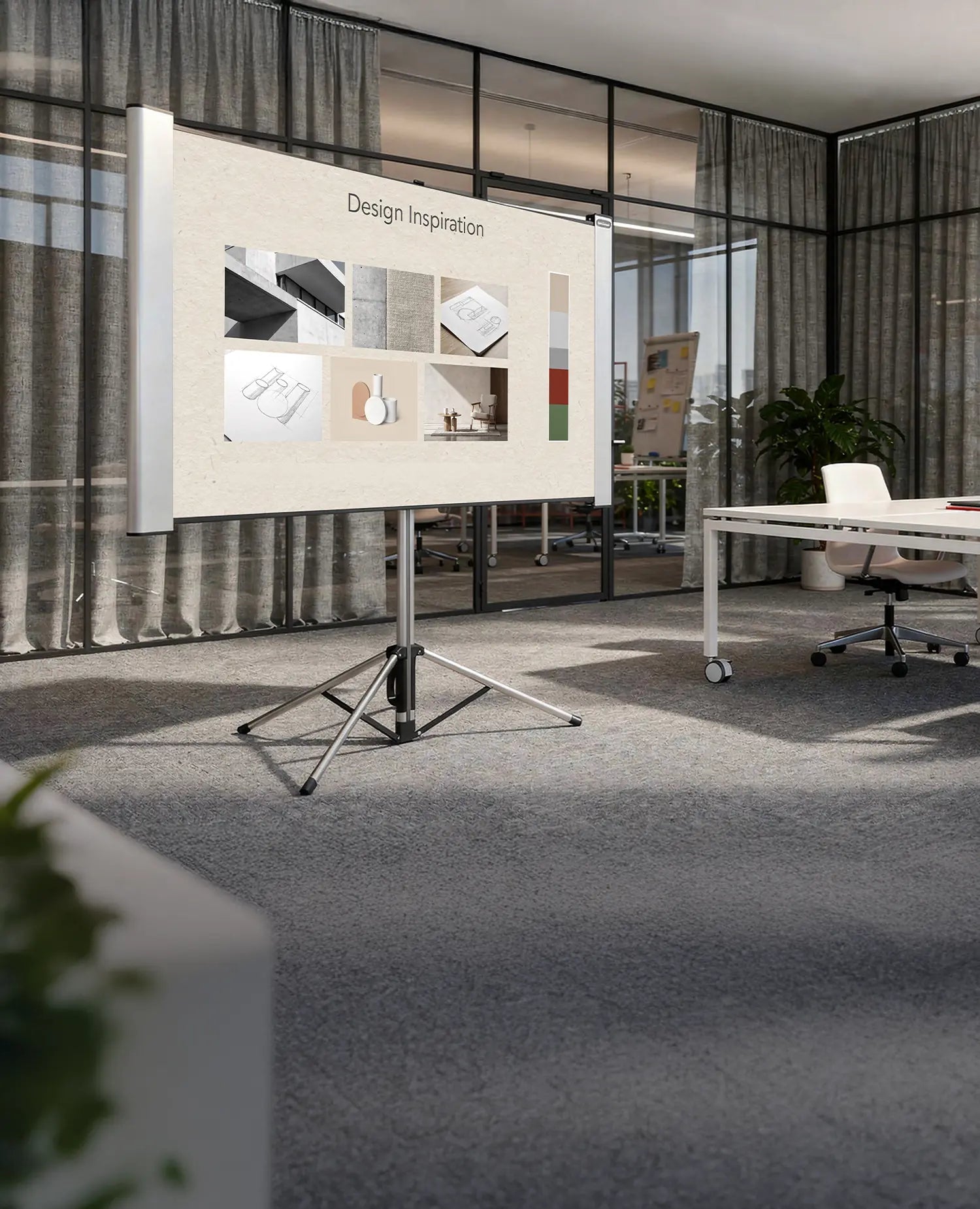 The image shows a modern workspace or creative studio with glass walls and open office structures. At the center stands a celexon Dual Format Tripod Screen Mobile Expert displaying a presentation titled “Design Inspiration,” consisting of various material, architecture, and design examples as well as a color palette.